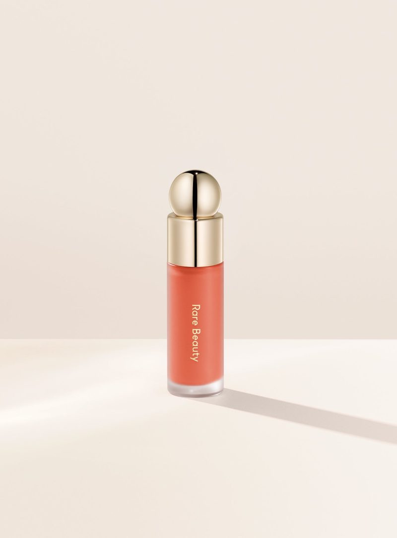 Joy| Rare Beauty's Soft Pinch Liquid Blush in the muted peach shade "Joy."