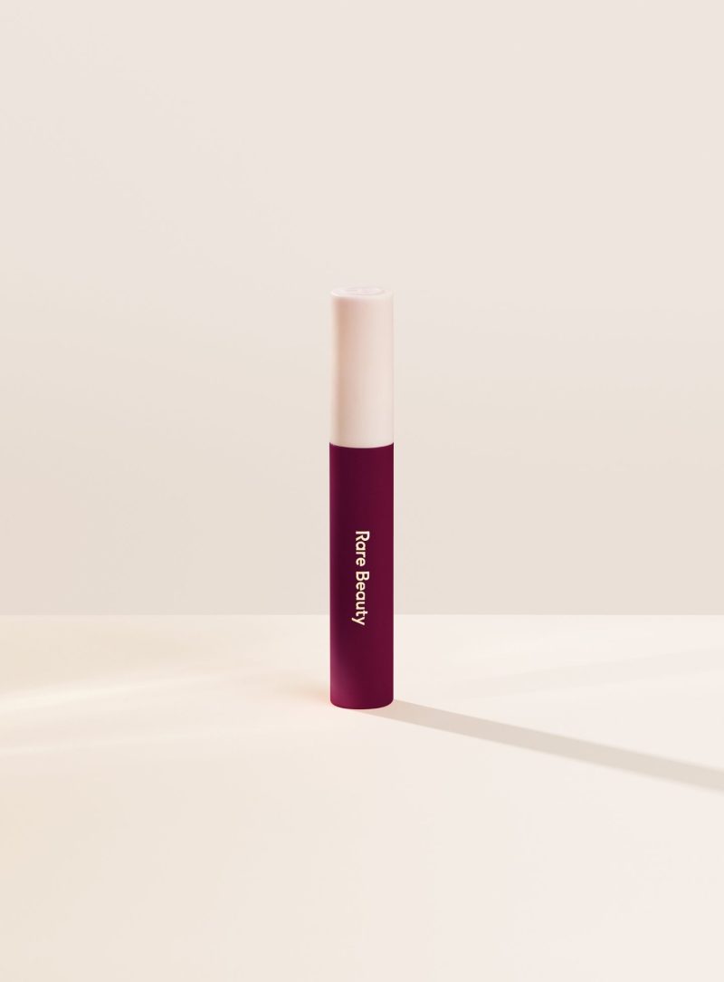 Strengthen| Shade Strengthen, in a dark blue red, of the Lip Souffle Matte Lip Cream by Rare Beauty.