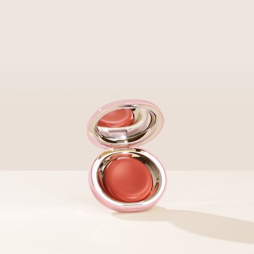 Nearly Apricot| Shade Nearly Apricot, in a muted coral, of Rare Beauty's Stay Vulnerable Melting Blush.