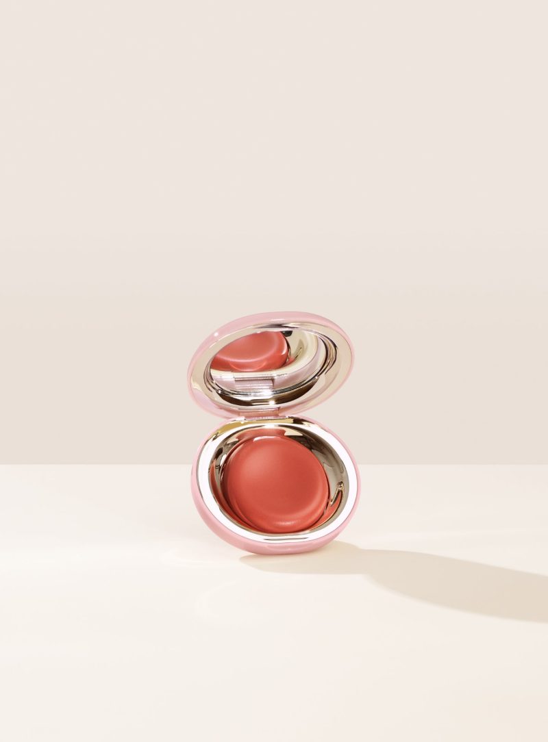 Nearly Apricot| Shade Nearly Apricot, in a muted coral, of Rare Beauty's Stay Vulnerable Melting Blush.