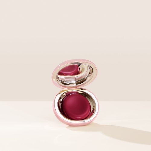 Nearly Berry| Shade Nearly Berry, in a deep berry, of Rare Beauty's Stay Vulnerable Melting Blush.