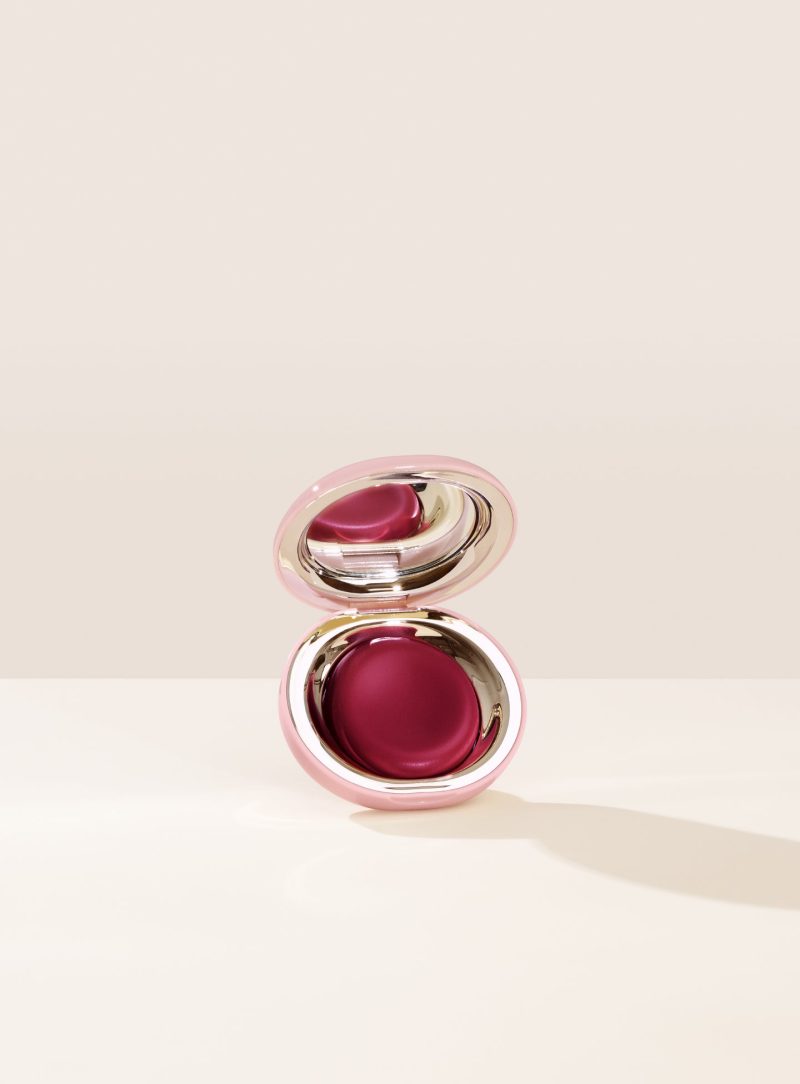 Nearly Berry| Shade Nearly Berry, in a deep berry, of Rare Beauty's Stay Vulnerable Melting Blush.