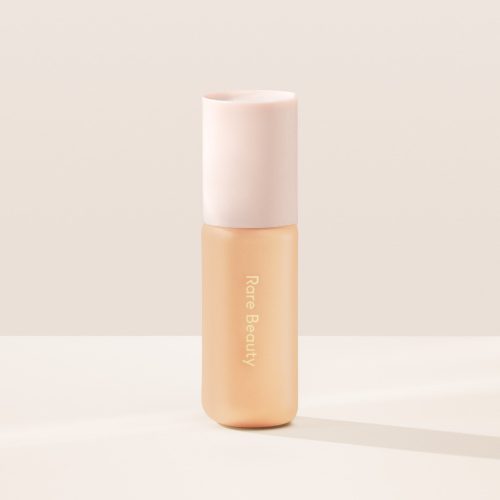 20W| Shade 20W, Light Medium with Warm Undertone, of Rare Beauty's Positive Light Tinted Moisturizer with SPF.