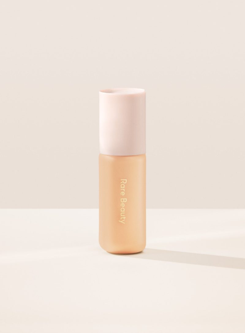 20W| Shade 20W, Light Medium with Warm Undertone, of Rare Beauty's Positive Light Tinted Moisturizer with SPF.